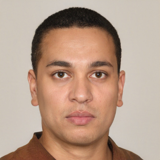Neutral latino young-adult male with short  brown hair and brown eyes