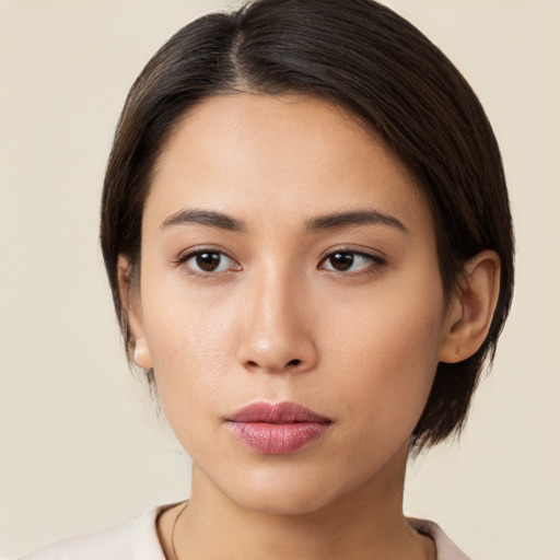 Neutral white young-adult female with medium  brown hair and brown eyes