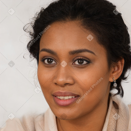 Joyful black young-adult female with long  brown hair and brown eyes