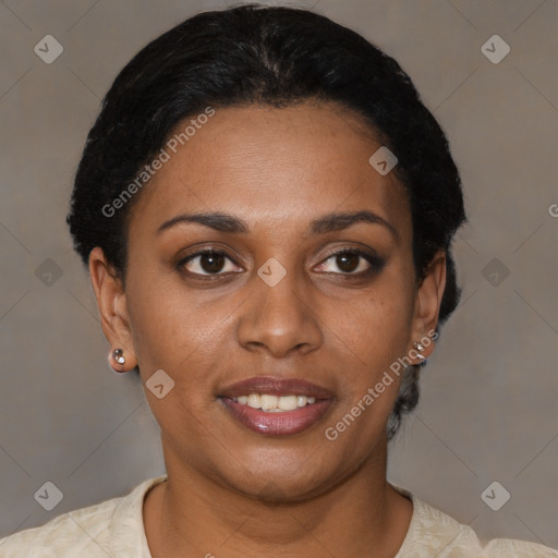 Joyful black young-adult female with short  brown hair and brown eyes