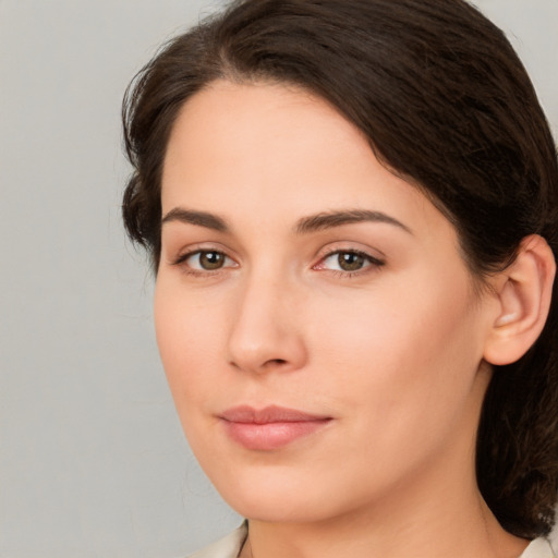 Neutral white young-adult female with medium  brown hair and brown eyes