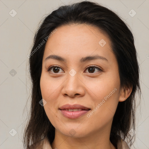 Joyful asian young-adult female with medium  brown hair and brown eyes