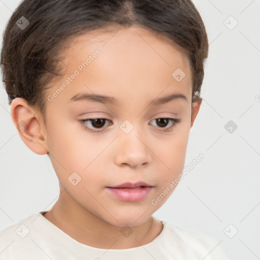 Joyful white child female with short  brown hair and brown eyes