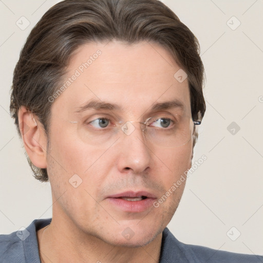 Neutral white adult male with short  brown hair and grey eyes