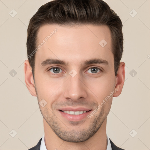 Joyful white young-adult male with short  brown hair and brown eyes