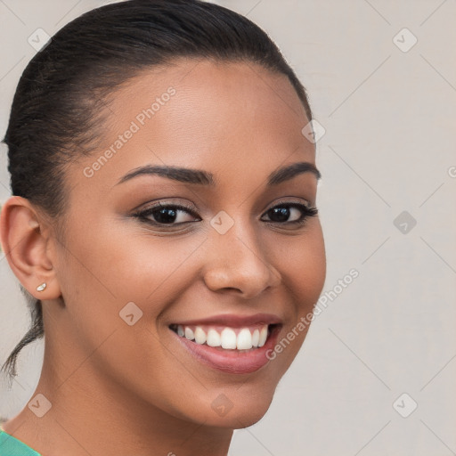 Joyful latino young-adult female with short  brown hair and brown eyes