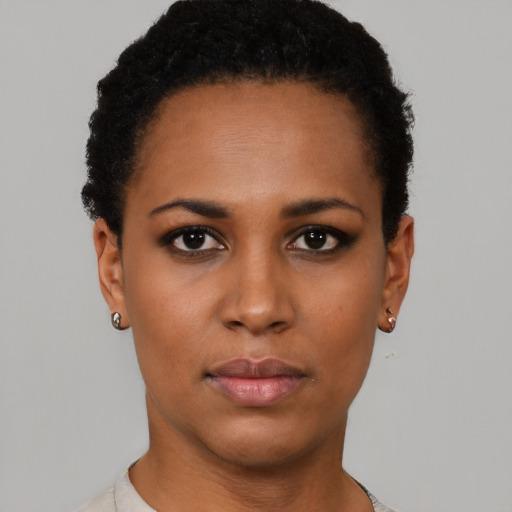 Neutral black young-adult female with short  black hair and brown eyes
