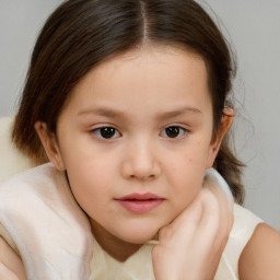 Neutral white child female with medium  brown hair and brown eyes