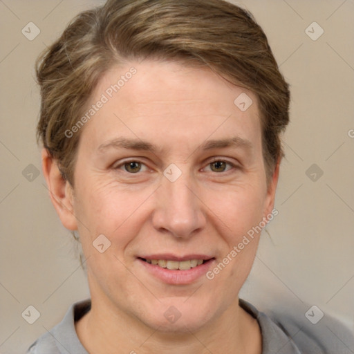 Joyful white adult female with short  brown hair and brown eyes