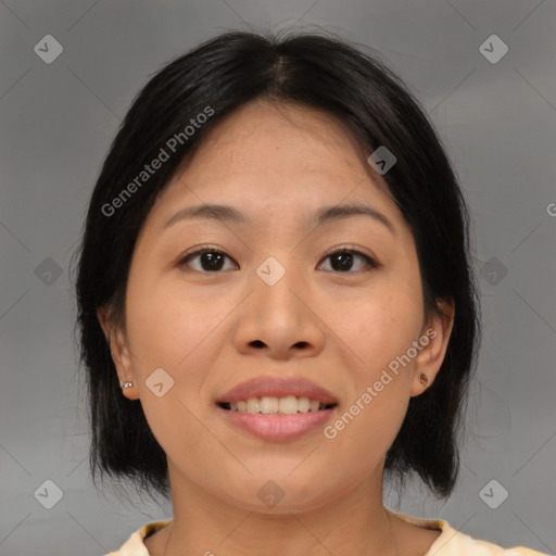 Joyful asian adult female with medium  brown hair and brown eyes