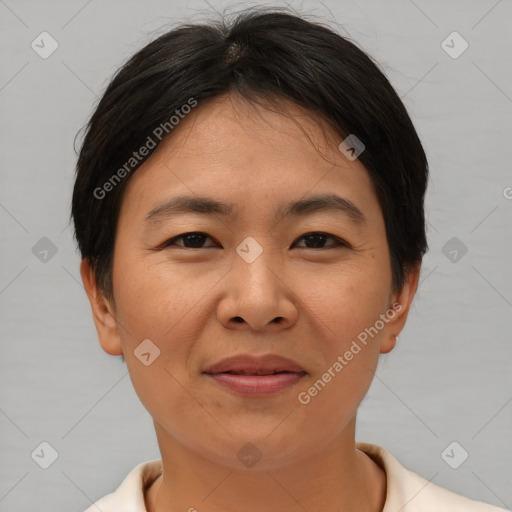 Joyful asian young-adult female with short  brown hair and brown eyes