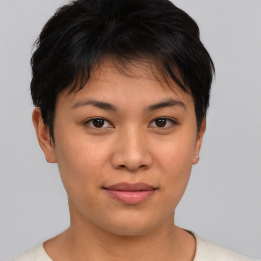 Joyful asian young-adult female with short  brown hair and brown eyes