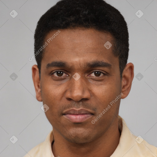 Neutral latino young-adult male with short  black hair and brown eyes