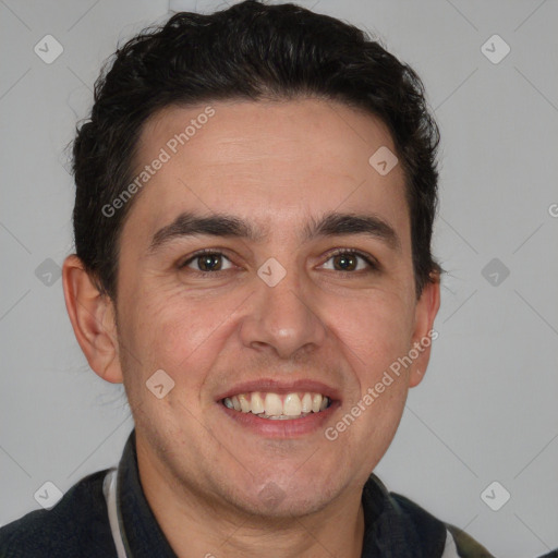 Joyful white adult male with short  brown hair and brown eyes