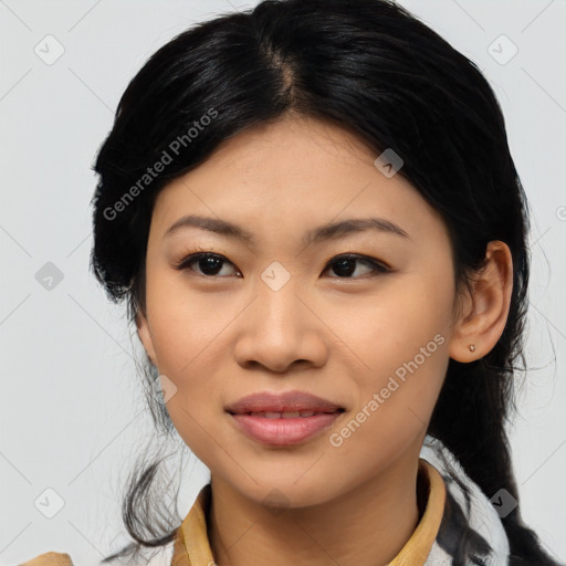 Joyful asian young-adult female with medium  black hair and brown eyes