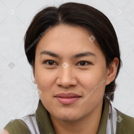 Joyful asian young-adult female with medium  brown hair and brown eyes