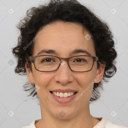 Joyful white adult female with short  brown hair and brown eyes