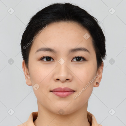 Joyful asian young-adult female with short  brown hair and brown eyes