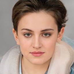 Neutral white young-adult female with medium  brown hair and brown eyes