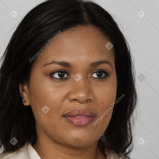 Joyful black young-adult female with long  brown hair and brown eyes