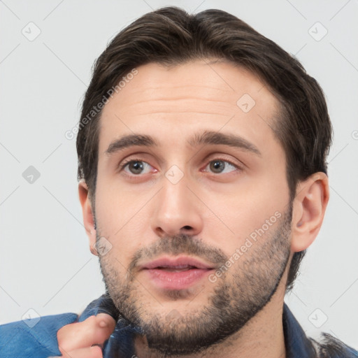 Neutral white young-adult male with short  brown hair and brown eyes