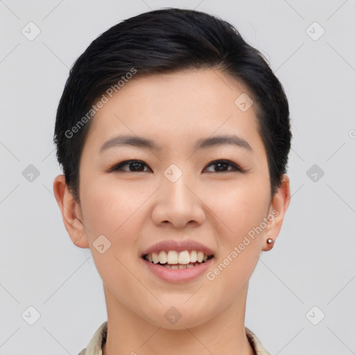 Joyful asian young-adult female with short  black hair and brown eyes