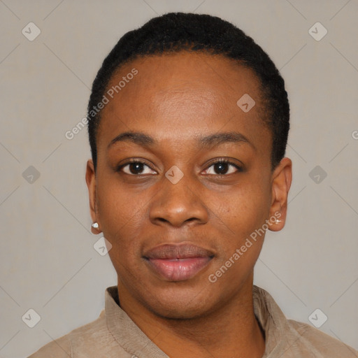 Joyful black young-adult female with short  black hair and brown eyes