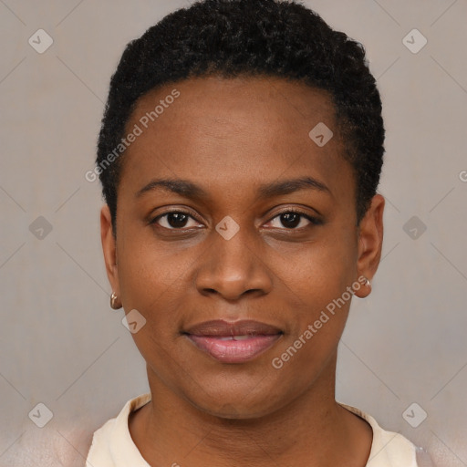 Joyful black young-adult female with short  brown hair and brown eyes