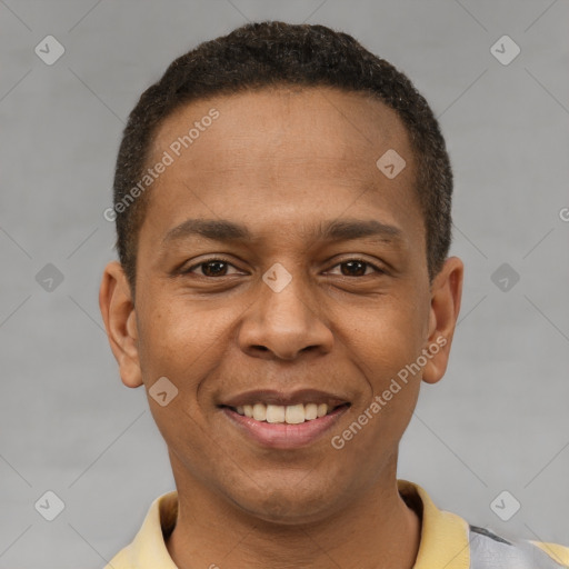 Joyful latino young-adult male with short  brown hair and brown eyes