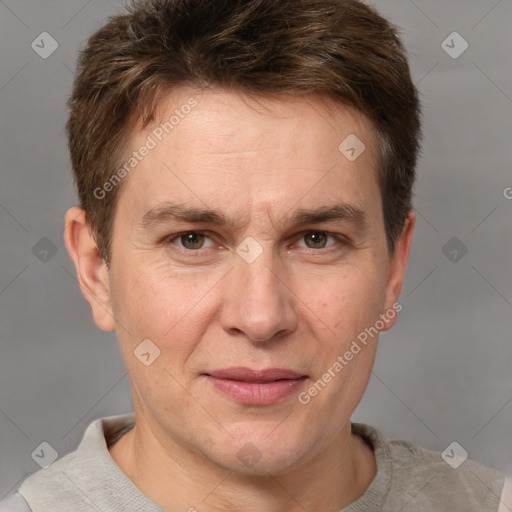 Joyful white adult male with short  brown hair and grey eyes