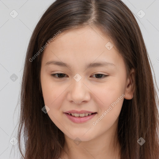 Joyful white child female with long  brown hair and brown eyes