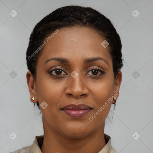 Joyful black young-adult female with short  brown hair and brown eyes