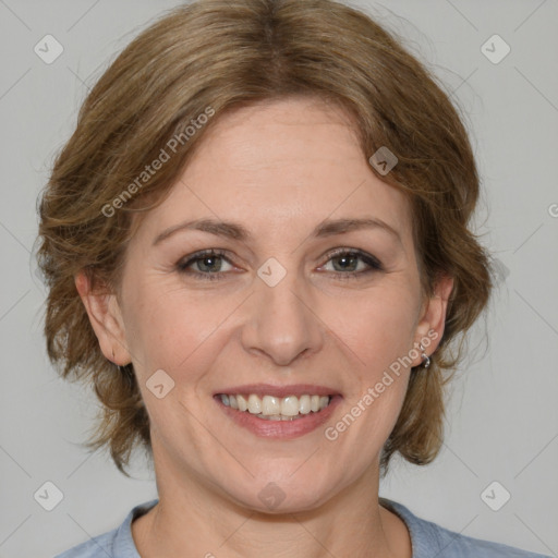 Joyful white young-adult female with medium  brown hair and blue eyes