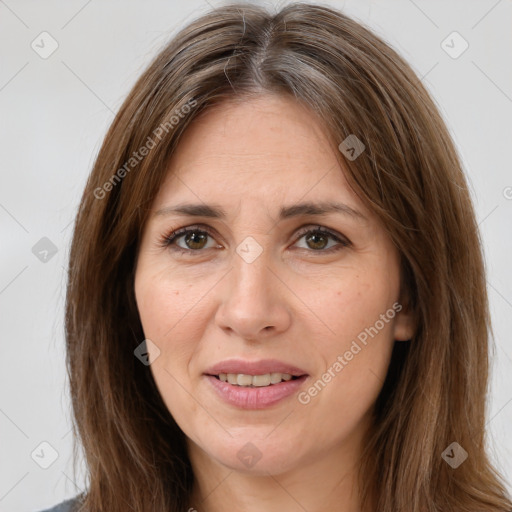 Joyful white adult female with medium  brown hair and brown eyes