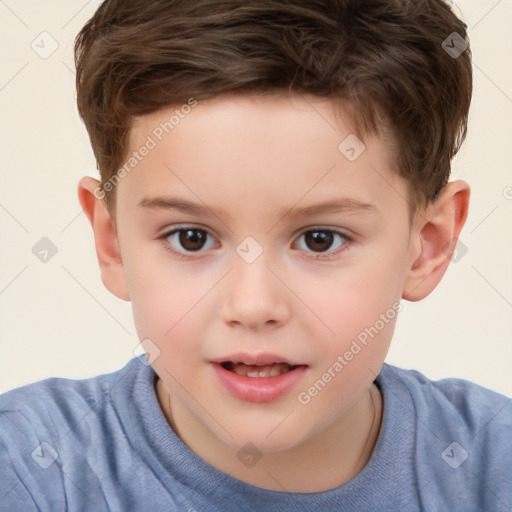 Joyful white child male with short  brown hair and brown eyes