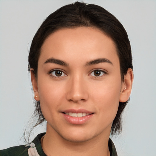 Joyful white young-adult female with medium  brown hair and brown eyes