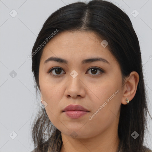 Joyful asian young-adult female with long  brown hair and brown eyes