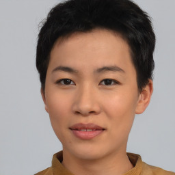 Joyful asian young-adult female with short  black hair and brown eyes