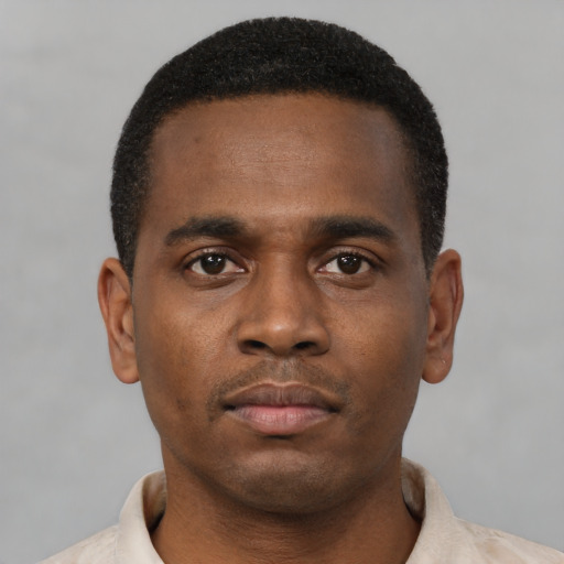 Neutral black young-adult male with short  black hair and brown eyes