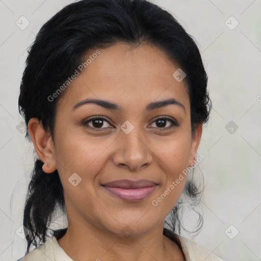 Joyful latino young-adult female with medium  brown hair and brown eyes