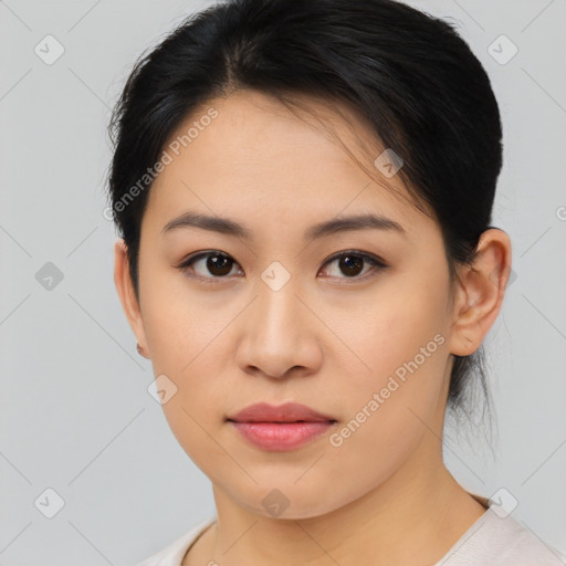 Neutral asian young-adult female with medium  brown hair and brown eyes