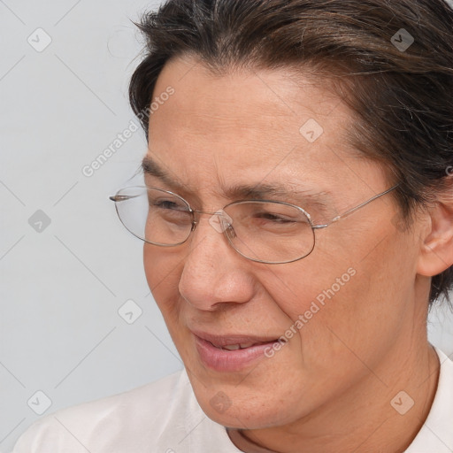 Joyful white adult female with short  brown hair and brown eyes