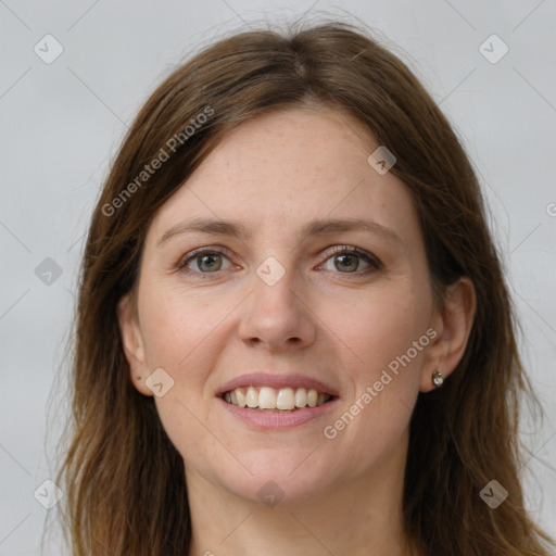 Joyful white young-adult female with long  brown hair and grey eyes