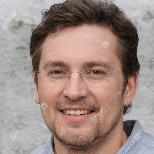 Joyful white adult male with short  brown hair and grey eyes