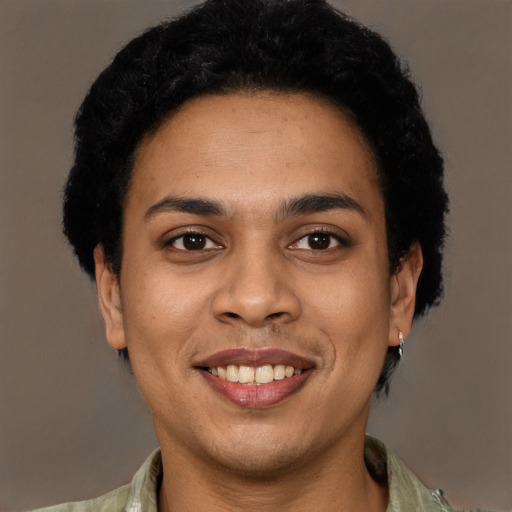 Joyful latino young-adult female with short  black hair and brown eyes