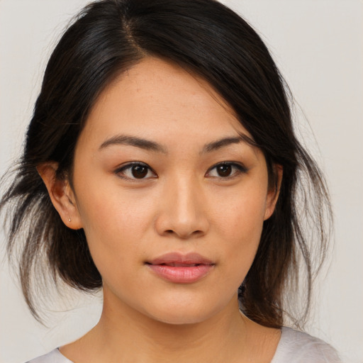 Neutral asian young-adult female with medium  brown hair and brown eyes