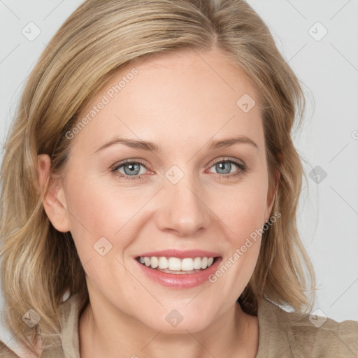 Joyful white young-adult female with medium  brown hair and blue eyes