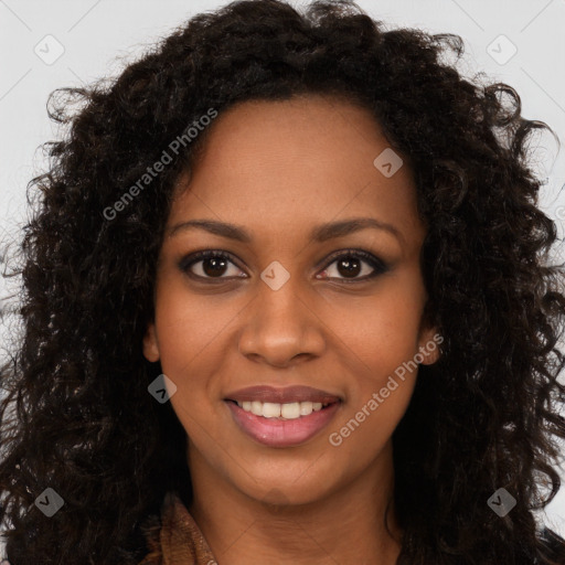 Joyful black young-adult female with long  brown hair and brown eyes