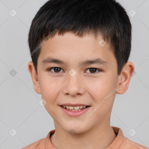 Joyful white child male with short  brown hair and brown eyes