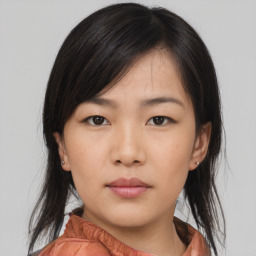 Neutral asian young-adult female with medium  brown hair and brown eyes